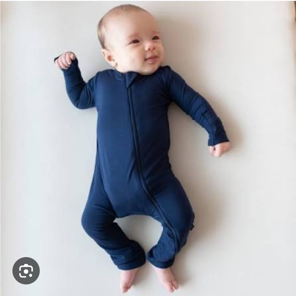 Kyte Zippered Romper in Navy Blue